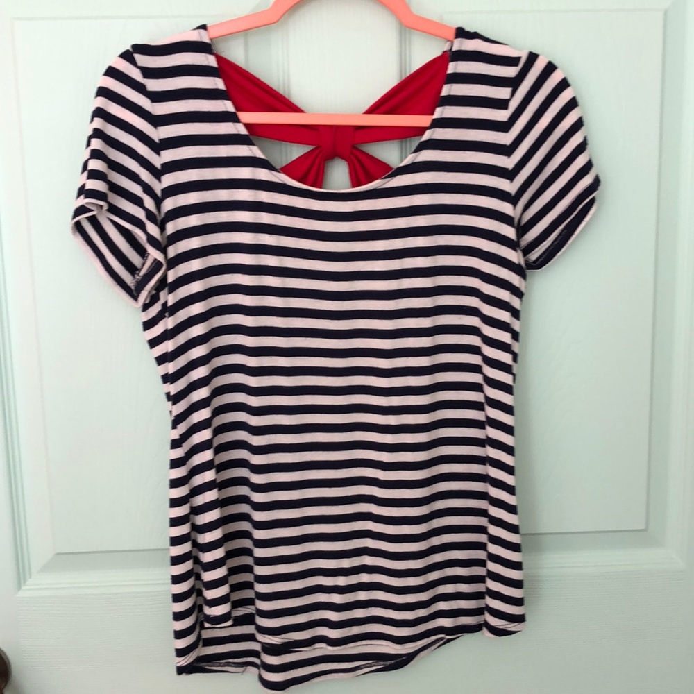 White and blue stripe shirt with a red bow